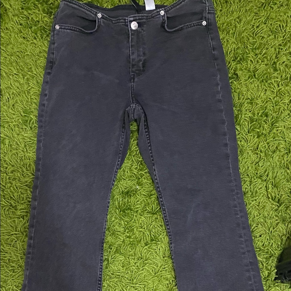 Low waisted faded black jeans